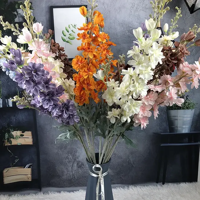 Fleurs artificielles de simulation de flocage de delphinium