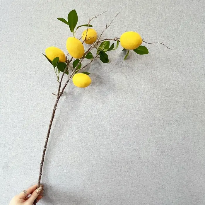 Branche de citron artificielle à feuilles vertes