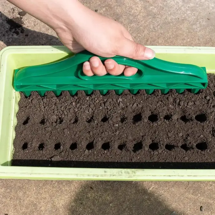 Semoir portable pour jardinage