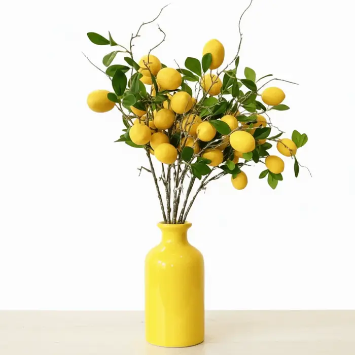 Branche de citron artificielle à feuilles vertes