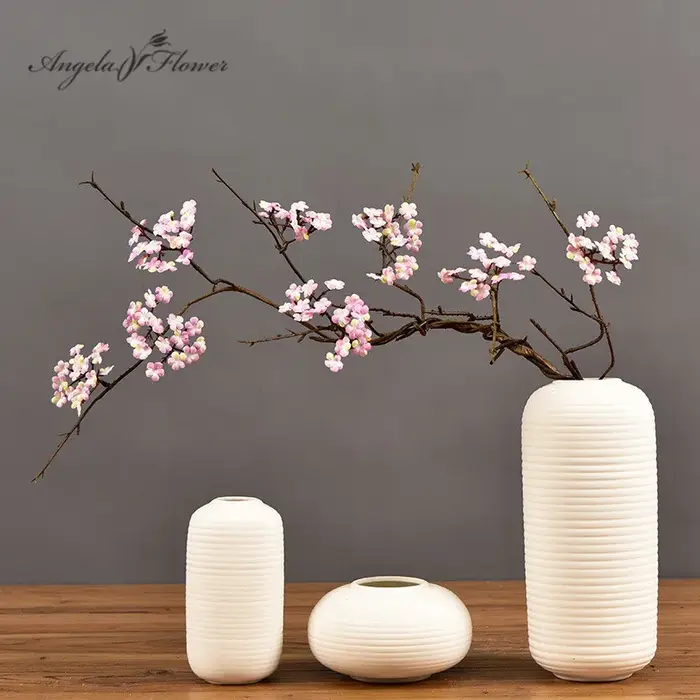 Branche de canne à fleurs de cerisier
