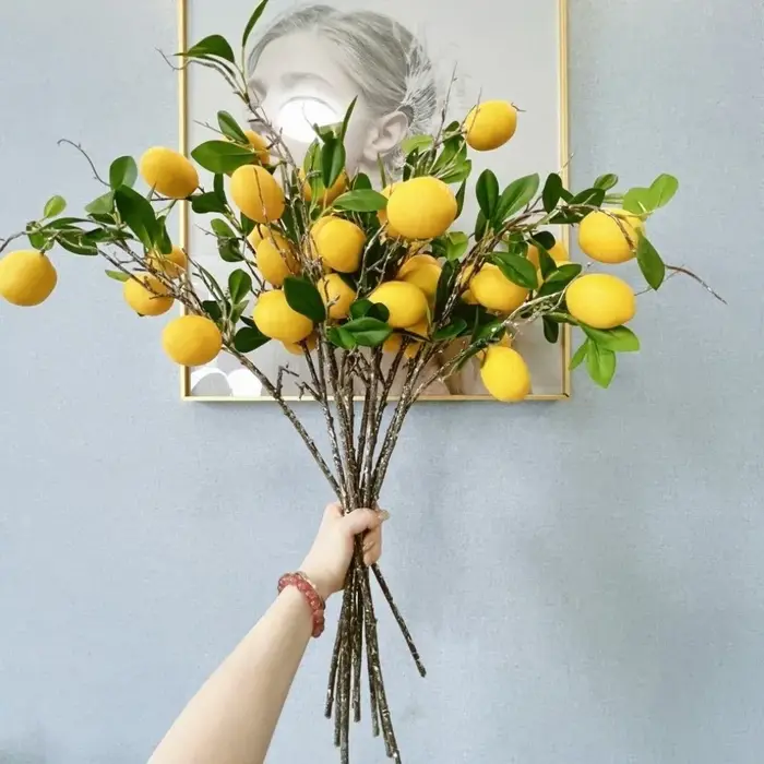 Feuilles vertes, branche de citron artificielle