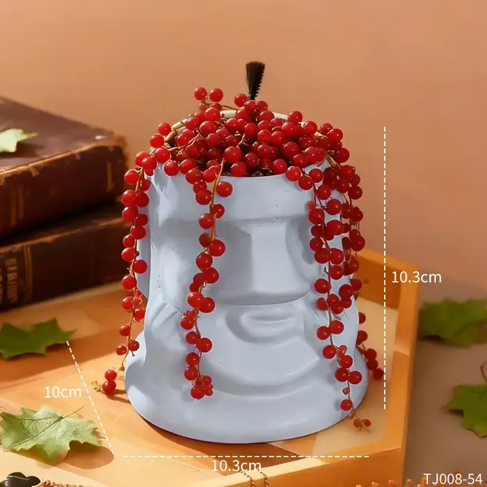 Pot de fleurs en céramique créatif en forme de visage de Moaï