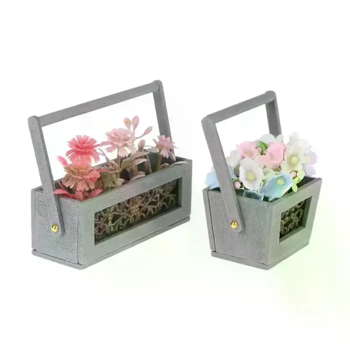 Panier de fleurs miniature exquis avec fleurs artificielles