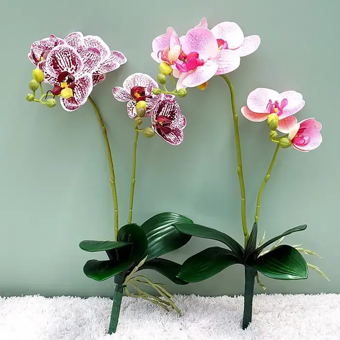 Fleurs artificielles orchidées papillon en plastique
