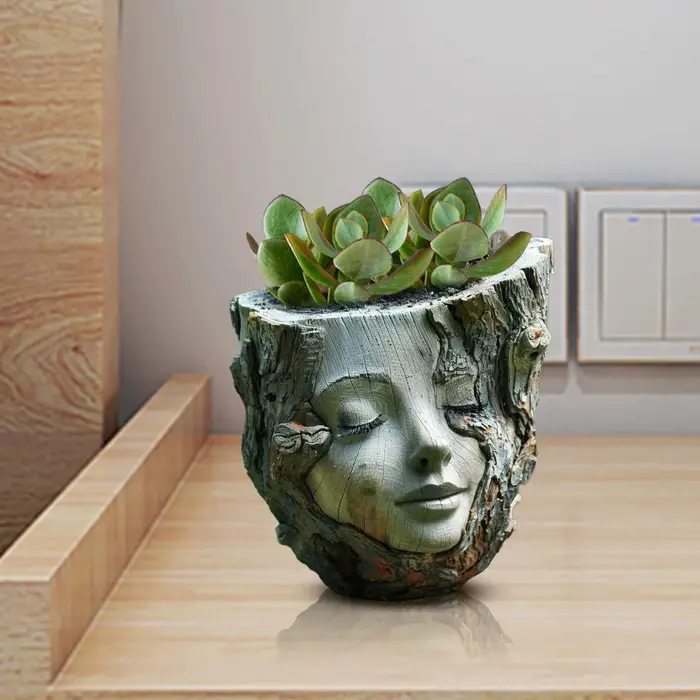 Pot de fleurs en forme de tête en résine