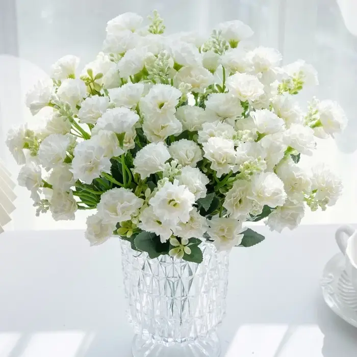 Couronne d'oeillets de fleurs artificielles