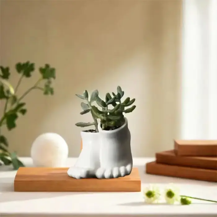 Pot de fleurs en céramique créatif en forme de pied
