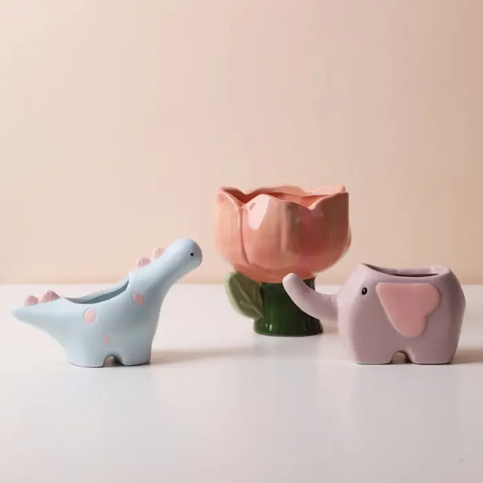 Pot de fleurs en céramique en forme d'éléphant