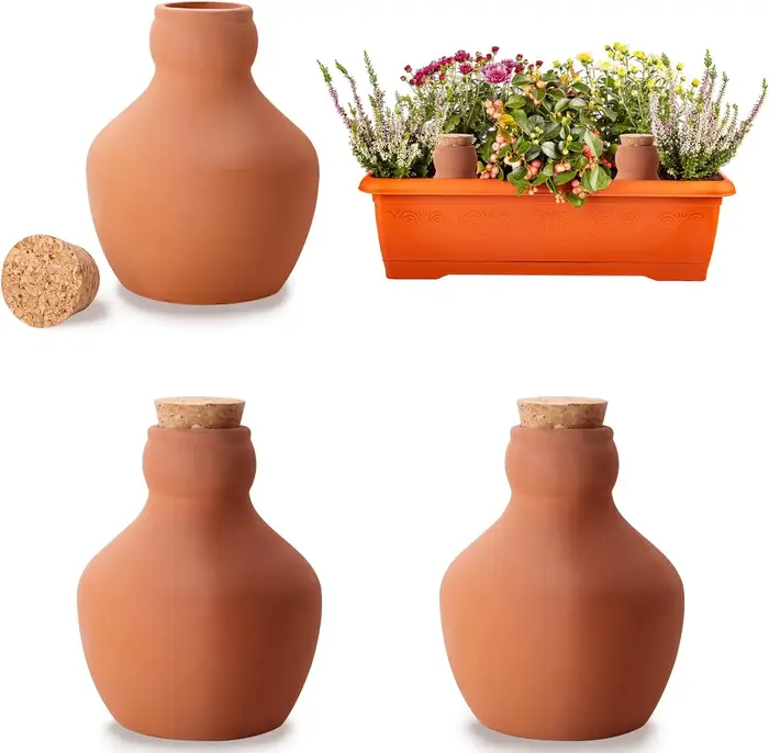 Globes d'arrosage en terre cuite