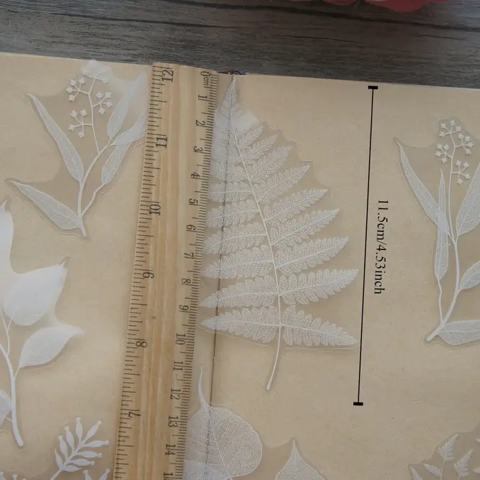 Autocollants en forme de feuilles blanches
