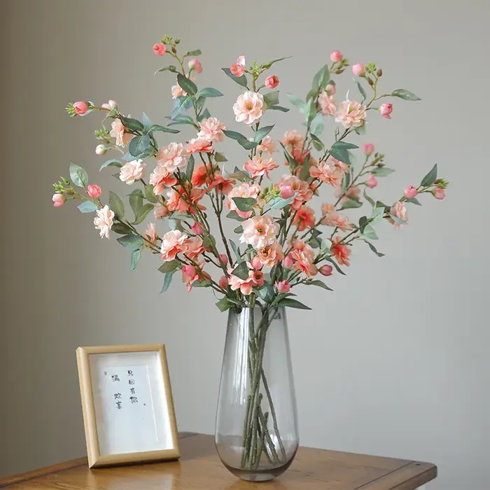 Nouvelle camélia fleur simulée longue branche avec fausses feuilles