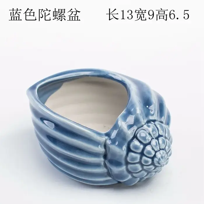 Pot de fleurs miniature en forme de baleine et de coquillage