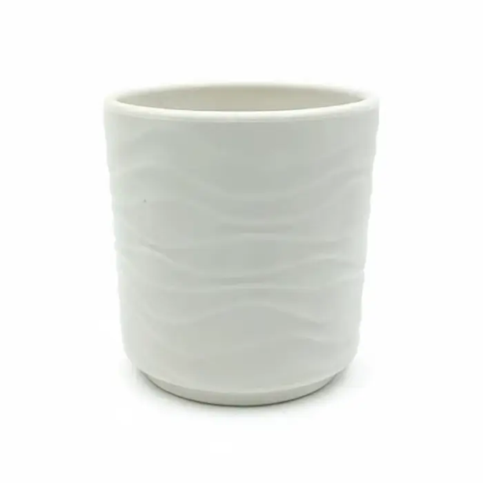 Les pots de fleurs simples en forme de vague