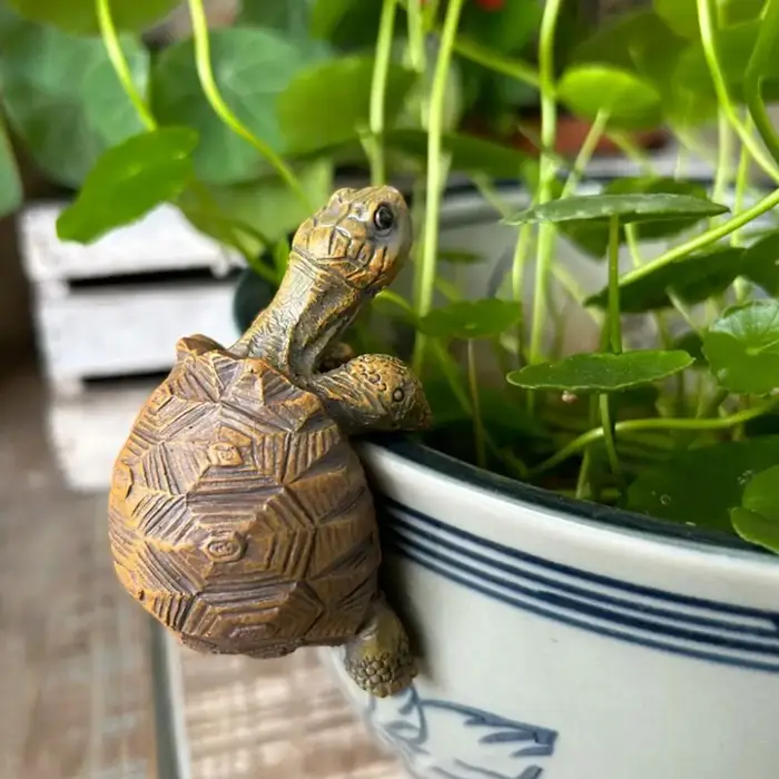 Support de pot de fleurs en forme de tortue