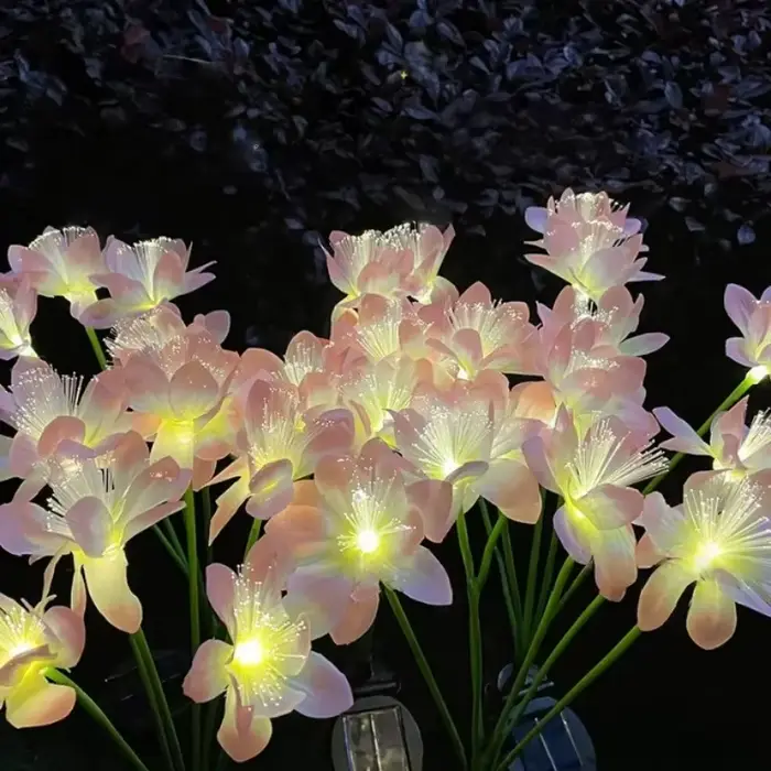 Lampe solaire à piquer en terre en forme de fleur de camélia