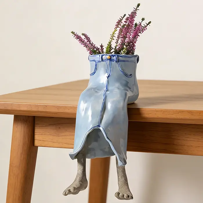 Pot de fleurs suspendu en forme de jambe