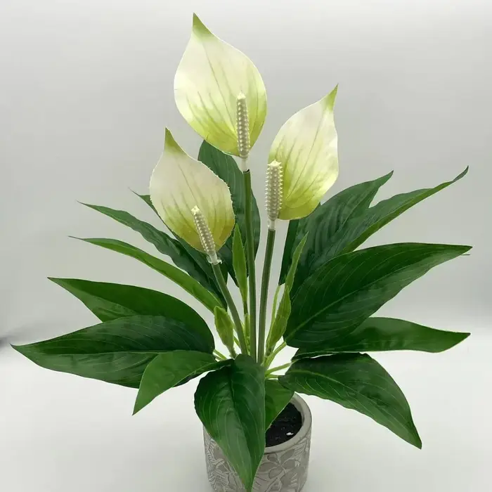 Fleur artificielle de calla printanière - Plante décorative à feuilles vertes et palmiers blancs pour la décoration