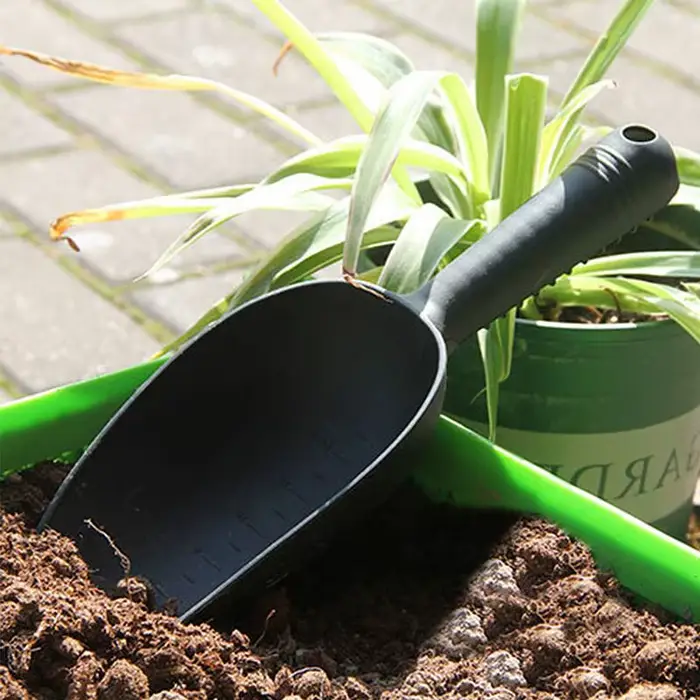 Pelle de jardin plate pour fleurs en pot