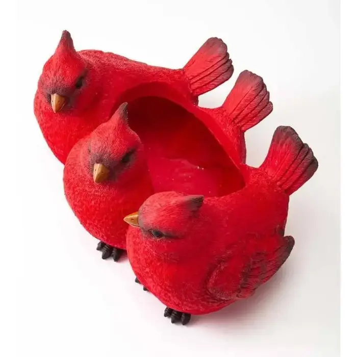 Pot de fleur à trois oiseaux rouge de dessin animé