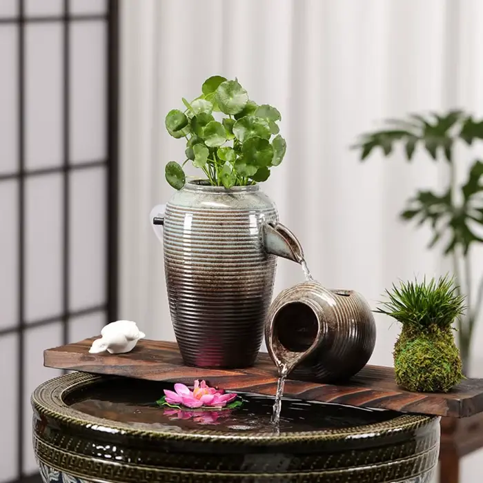 Pot à fleurs en céramique à ouverture supérieure avec circulation d'eau