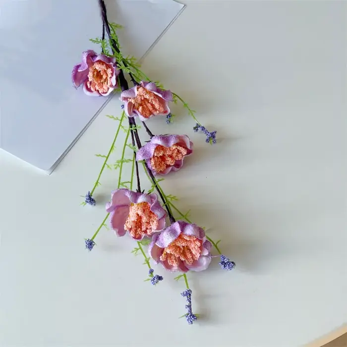 Fleur artificielle réaliste en forme de papillon