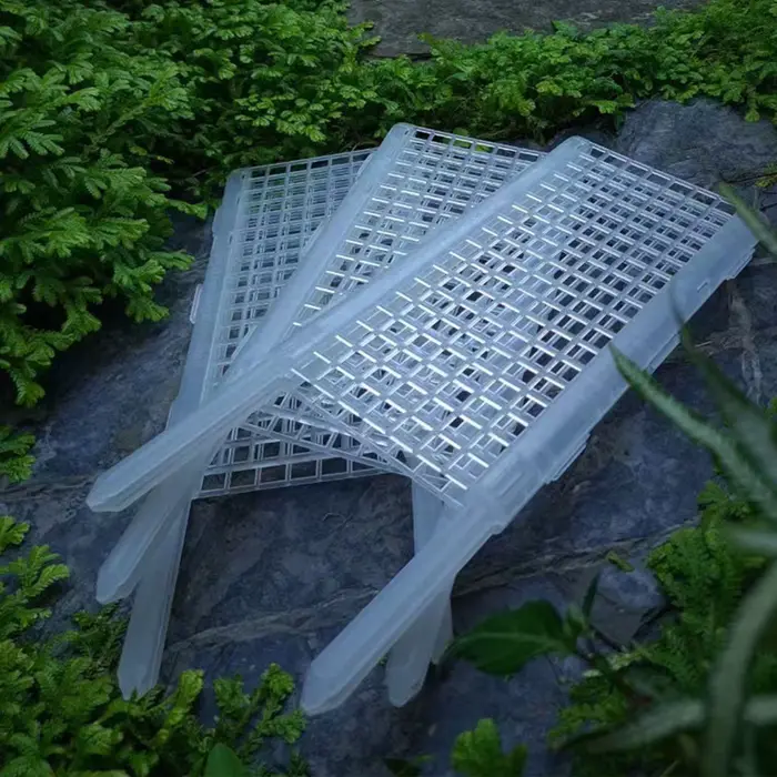 Support de plante verte en plastique