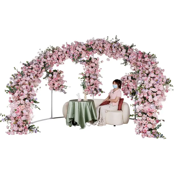 Arrangement de fleurs artificielles roses