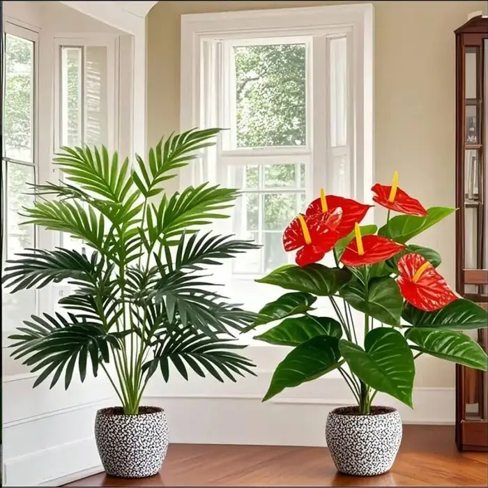 Grands plantes de palmier artificielles et feuilles de Cycads vertes Anthurium