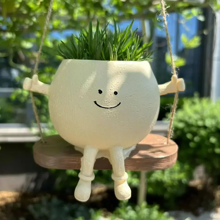 Pot de fleur succulent avec tête en résine