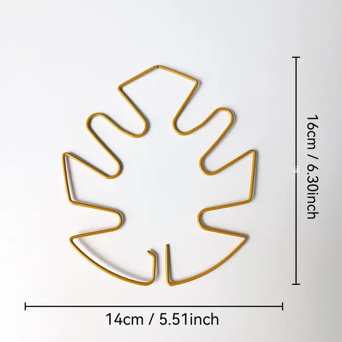 Support de plante en métal en forme de feuille de Monstera