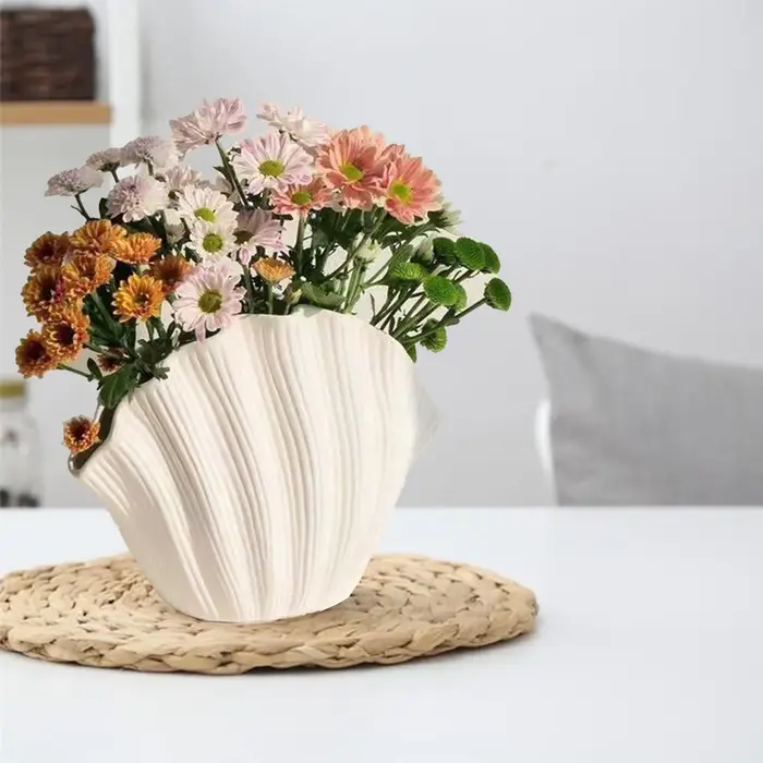 Vase en céramique coquillage