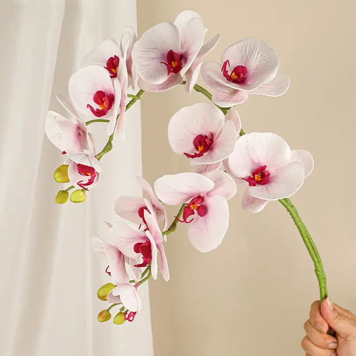 Branche de fleurs artificielles orchidées