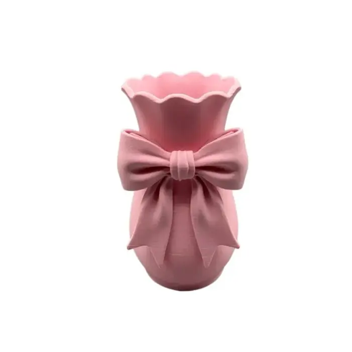 Vases à fleurs en forme de nœud rose au design torsadé